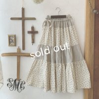 mifumi／ティアードパッチのスカート・黄小花